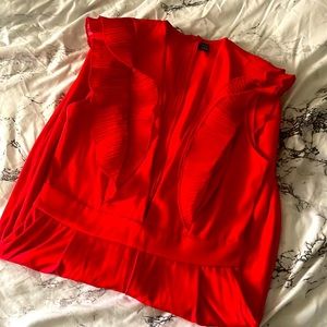 Stunning red romper pants suit never worn. Fits small